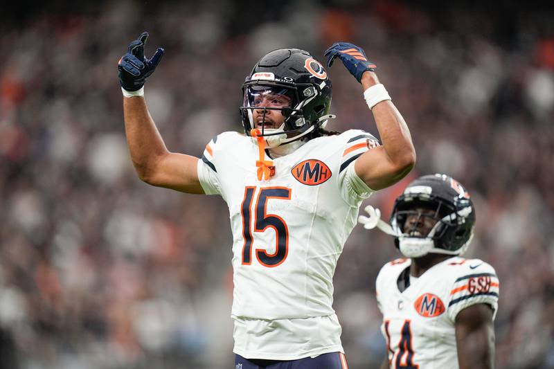Chicago Bears wide receiver Rome Odunze (15) celebrates a touchdown during the second half of an NFL football game against the Las Vegas Raiders Sunday, Sept. 28, 2025, in Las Vegas. (AP Photo/John Locher)