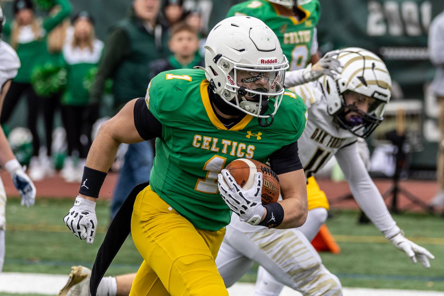 Providence's Bryaden McKay breaks away before scoring a touchdown during a 5A varsity football semifinal game against Oak Forest at Providence Catholic High School on Nov. 22, 2025.