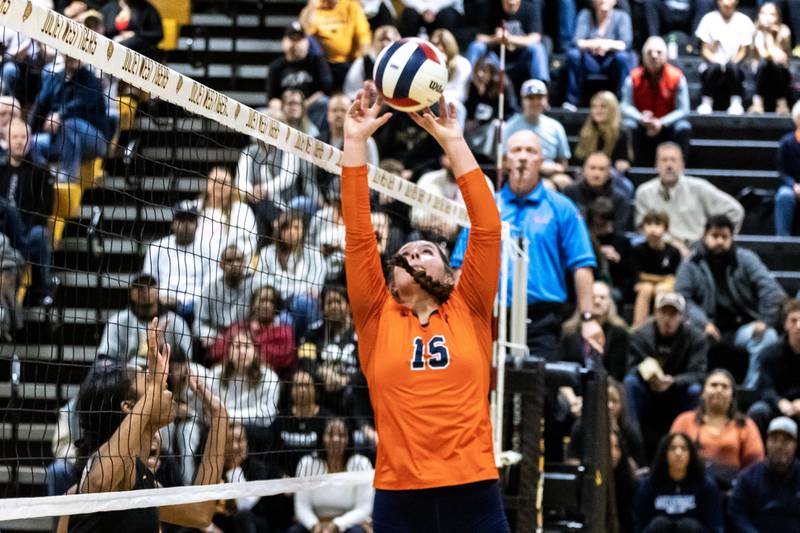 Oswego's Kimmie Reichard sets-up a teammate during a 4A sectional varsity volleyball game against Joliet West at Joliet West on Nov. 4, 2025.
