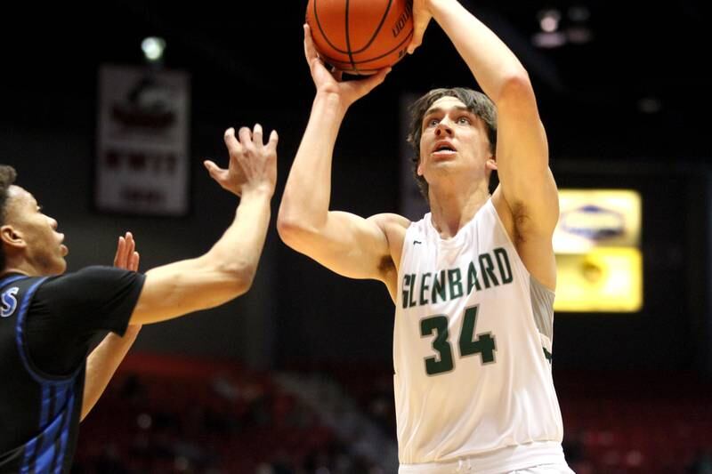 Glenbard West’s Braden Huff shoots the ball during a Class 4A DeKalb Supersectional game against Larkin at the Northern Illinois University Convocation Center on Monday, March 7, 2022.