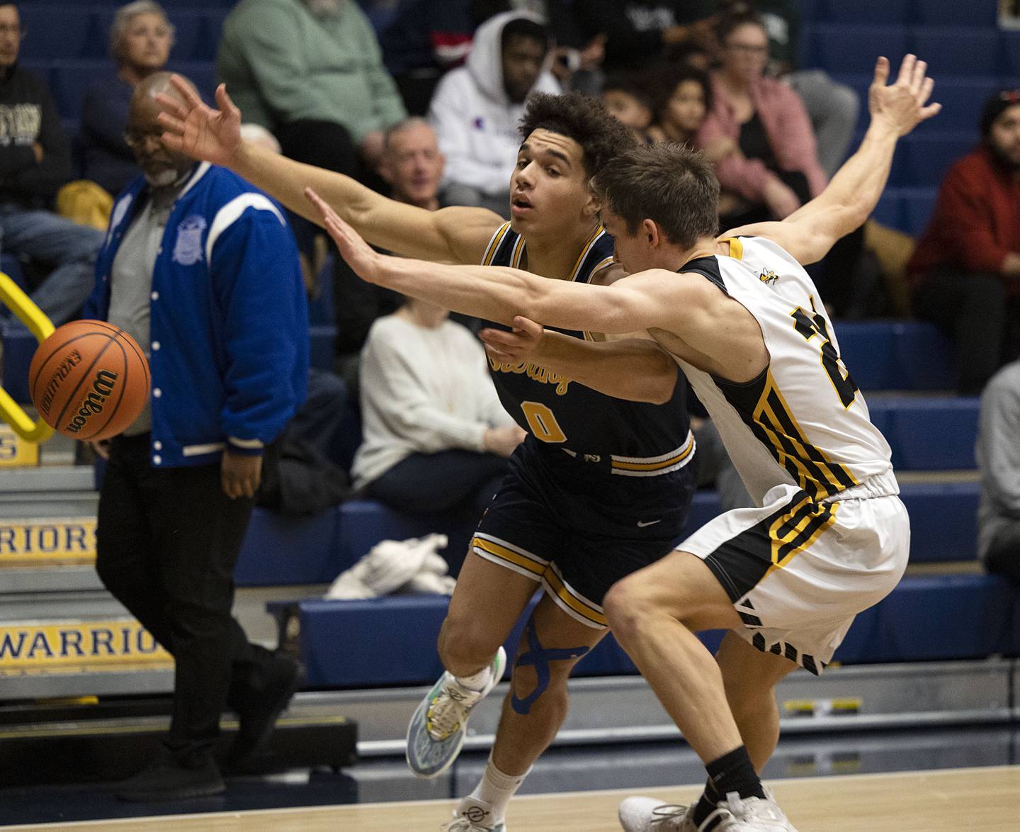 Sterling’s Andre Klaver works against Hinsdale South’s Brendan Savage Monday, Jan. 16, 2023 at the Sterling MLK basketball tournament.