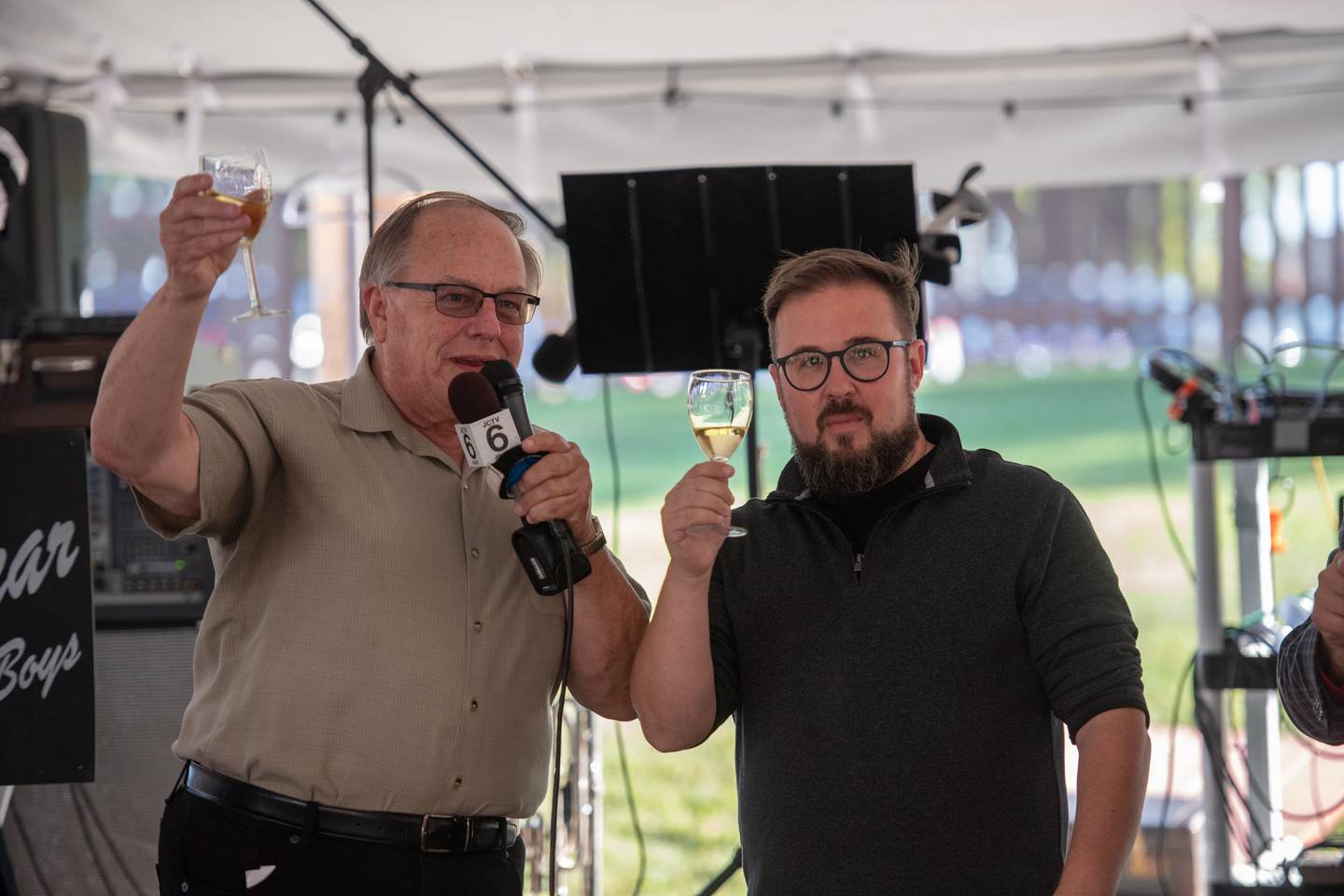 Honorary Mayor of the festival Michael Turk raises a glass of wine for the proclamation during the Slovenian Grape Harvest Festival  Sunday,Oct. 2, 2022 at Rivals Park Picnic grounds in Joliet