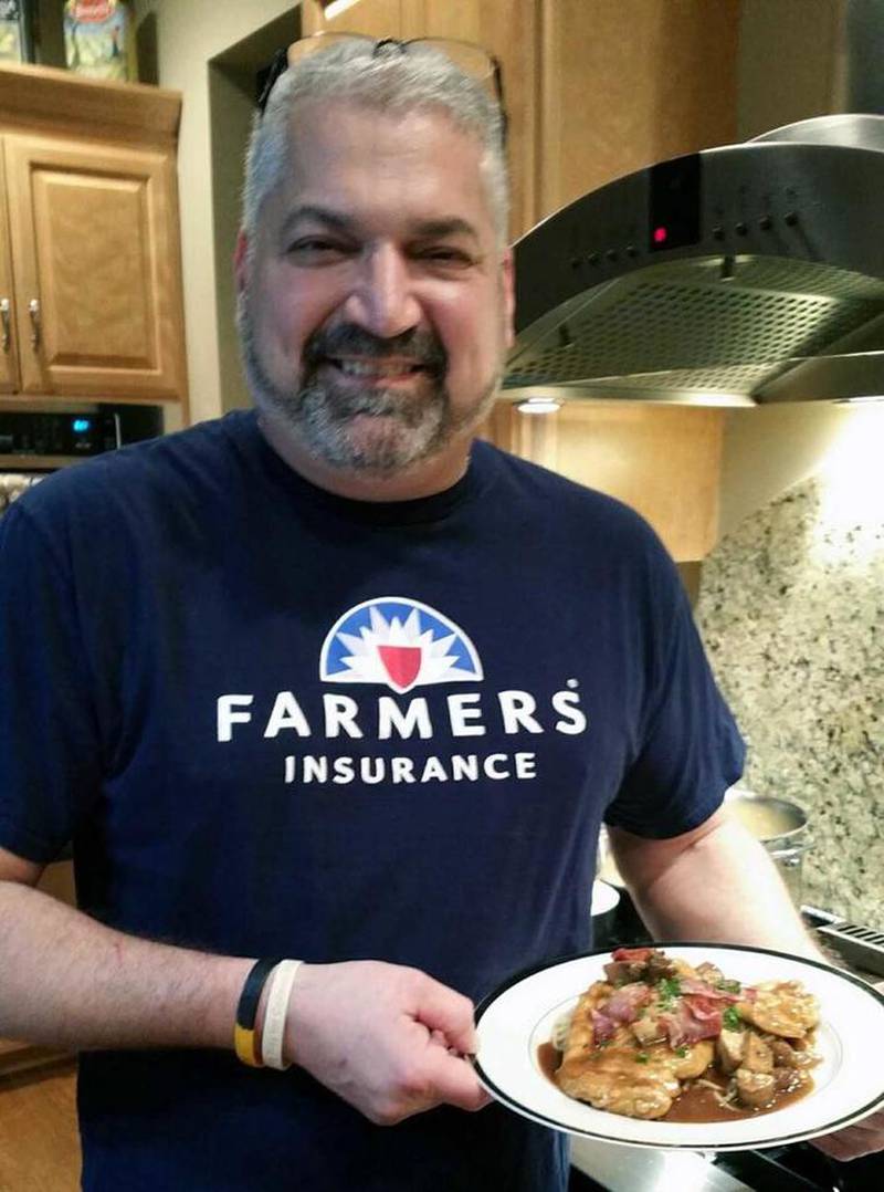 Garbin, owner of Garbin Insurance Agency in Joliet, is seen with his Chicken Marsala Wth Crispy Prosciutto.