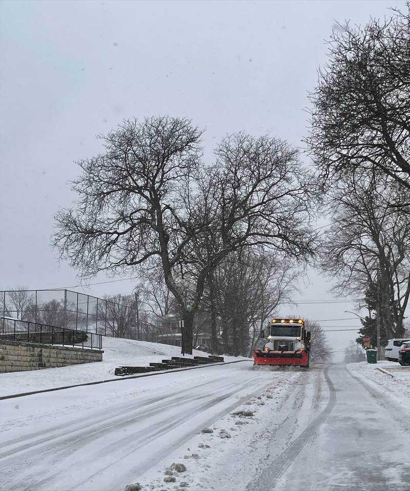 A snow plow clears Hamitlon Street between 10th and 11th streets in Lockport on Wednesday, Feb. 12, 2025.