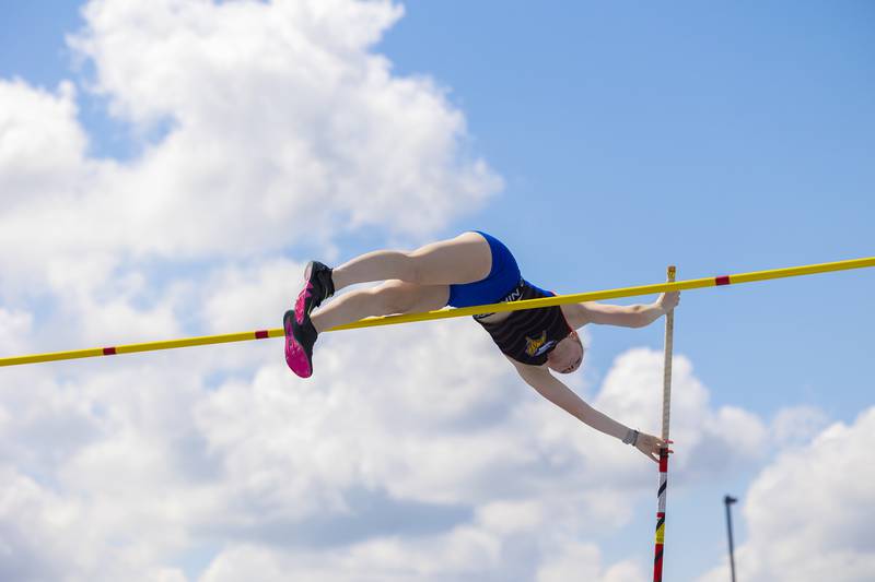 Newark’s Tess Carlson clears the bar in the 1A Pole Vault at the IHSA girls state track meet in Charleston last season.