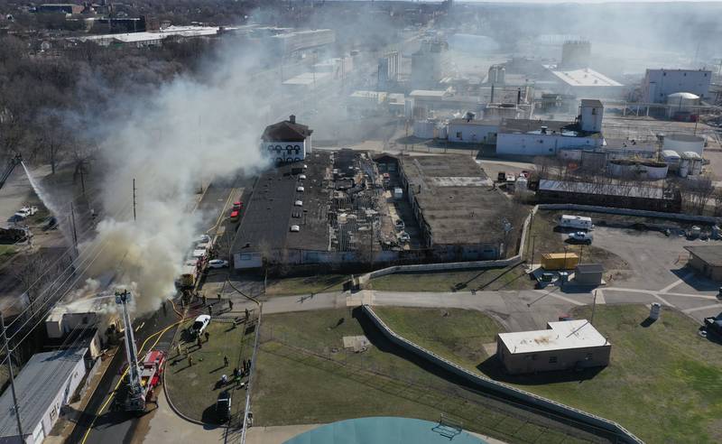 An aerial view looking east of heavy smoke pouring out of the former Platform 31 tavern on Monday, March 24, 2025 on Water Street in Peru. The fire was upgraded to a three-alarm summing ire departments from La Salle, Utica, Mendota, Tonica, Ottawa, Ladd, Spring Valley, Lostant, Cedar Point, Troy Grove and Peru responded to the fire.