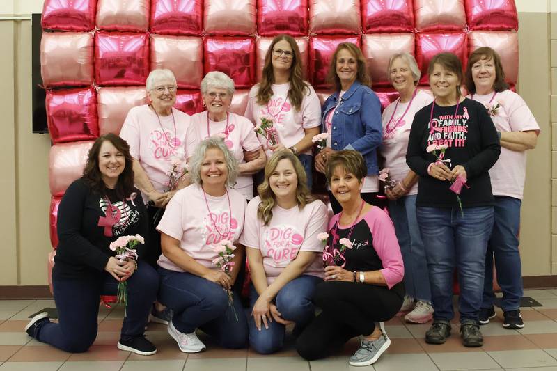 Local breast cancer survivors Carol Faber (back row-left), Charlotte Winckler, Ali Steimle, Veronica Saad, Darla Corbin, Joy Svihlik, Evelyn Fouts. Ann Schipper (front row-left), Rhonda DeWitte, Nicole Olinger, Suzy DeBuysere were honored Tuesday, Oct. 7, 2025, at Prophetstown High School during the annual Dig for Cure event. The Panther volleyball team hosted the Hall Red Devils with survivors recognized between games.