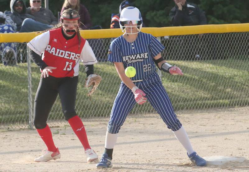 Newark's Addie Scherer stands on third base as the ball comes in late to Earlville's Riley Kelly during the Class 1A Regional final on Thursday, May 22, 2025 at Indian Creek High School in Shabbona.