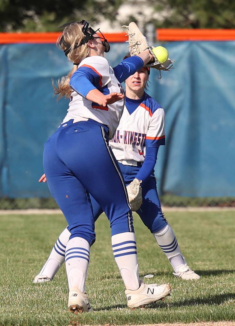 Genoa-Kingston's Emily Trzynka tries to make a running catch in front of center fielder Violet Northrup during their game against Stillman Valley Tuesday, April 18, 2023, at Genoa-Kingston High School.