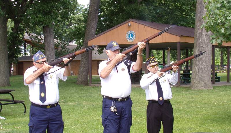 A firing squad fires three volleys Monday, May 27, 2024, during the Memorial Day ceremony at Veterans Memorial Plaza at City Park in Streator.