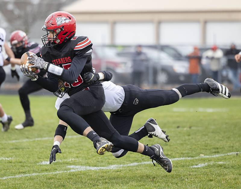 Fulton’s Dom Kramer hauls in a catch Saturday, Nov. 12, 2022 in a quarterfinal game against Le/Win.