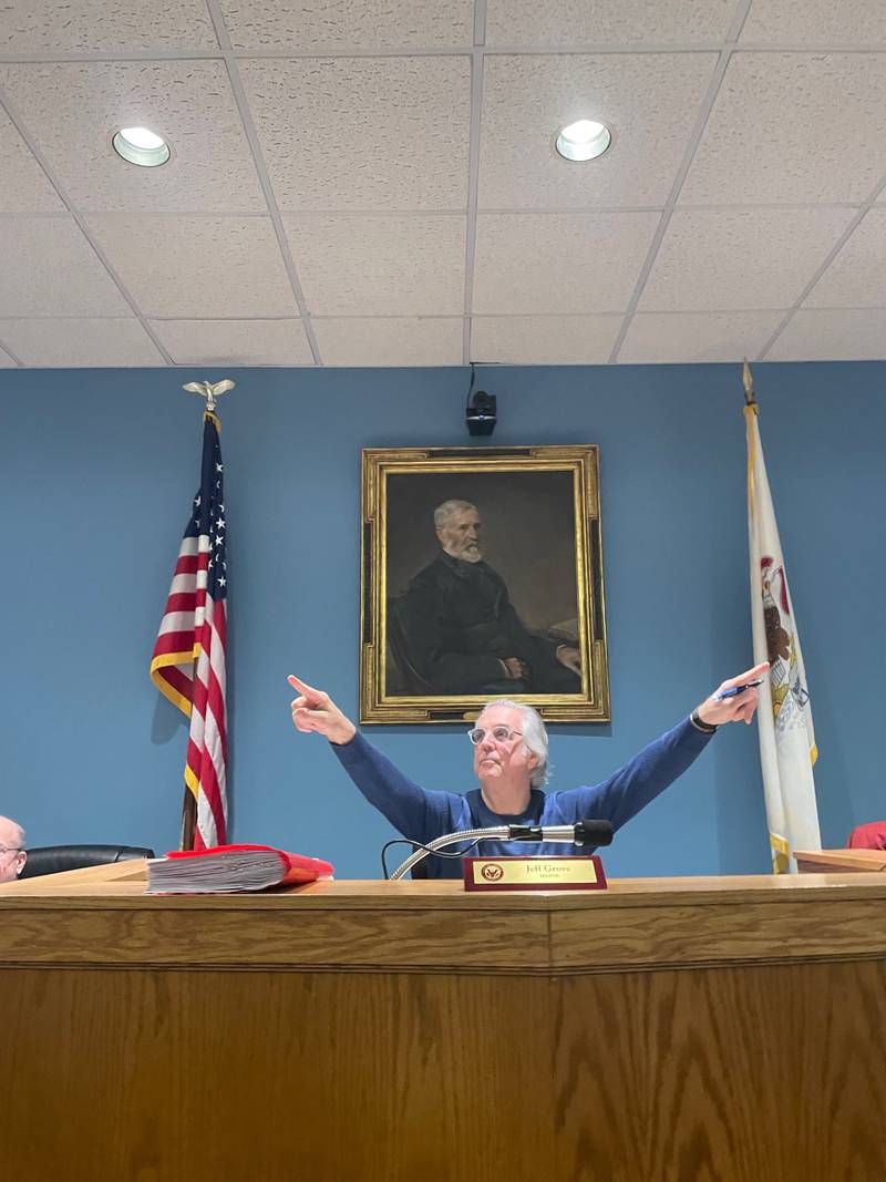 La Salle Alderman Tom Ptak points out two cameras facing the La Salle City Council, a third is mounted behind him, ahead of the council meeting Monday, Feb. 5, 2024. La Salle City Council meetings are now being recorded – the cameras were rolling at a Monday test run – and Monday’s recording soon should be available for viewing.