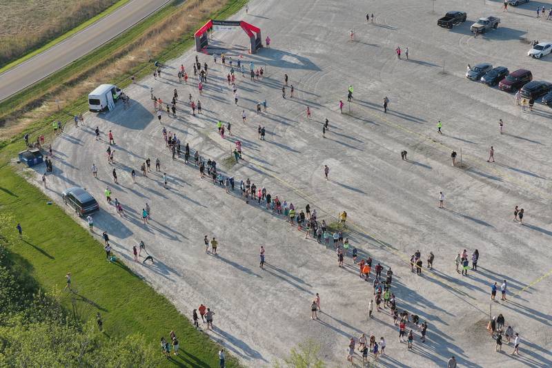 An aerial view of runners gathering at the starting line to begin the Starved Rock Country half-marathon on Saturday, May 10, 2025 at Starved Rock State Park.