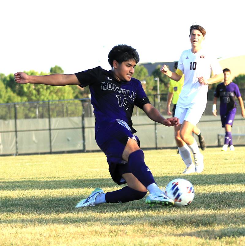 Rochelle's  Antonio Hueramo (in black and purple) slides to get possession of the ball during the game with Morris on Sept. 17, 2025.