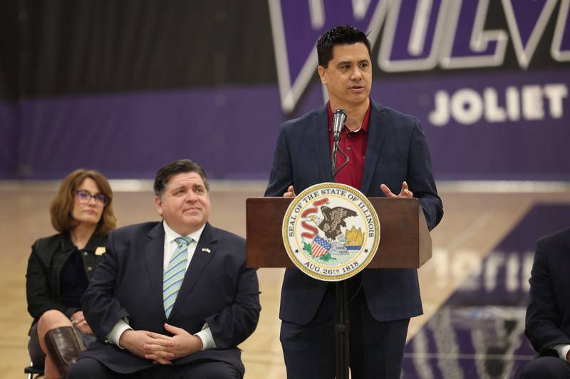 State Senator Meg Loughran Cappel (left) and Governor JB Pritzker listen to Nate Baguio, of Lion Electric, at a press conference regarding the state’s proposed investment in higher education at Joliet Junior College on Thursday, March 16th, 2023.