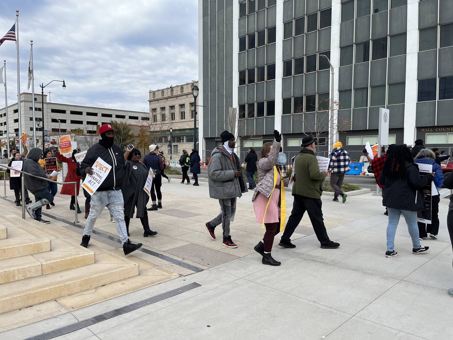 Protestors gather in downtown Joliet near the Will County Courthouse on Thursday, Oct. 20, 2022, in support of the SAFE-T Act.