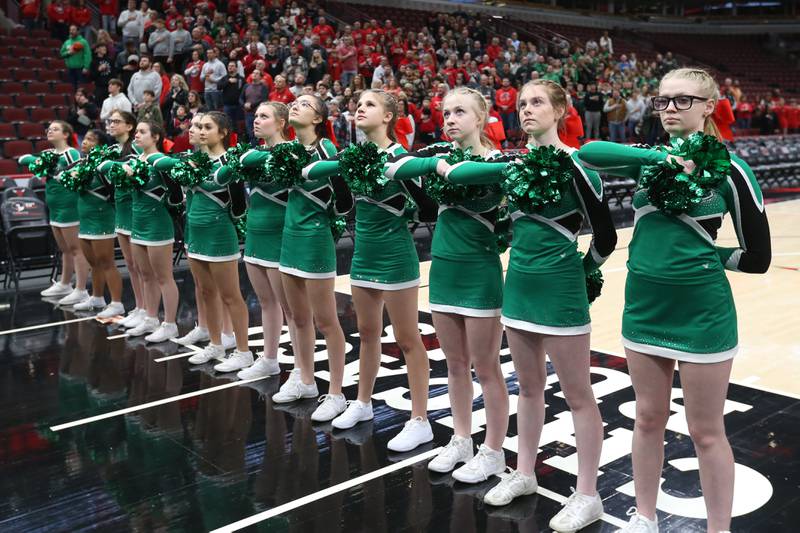 Seneca cheerleaders stand for the National Anthem on Tuesday, Dec. 21, 2023 at the United Center in Chicago.