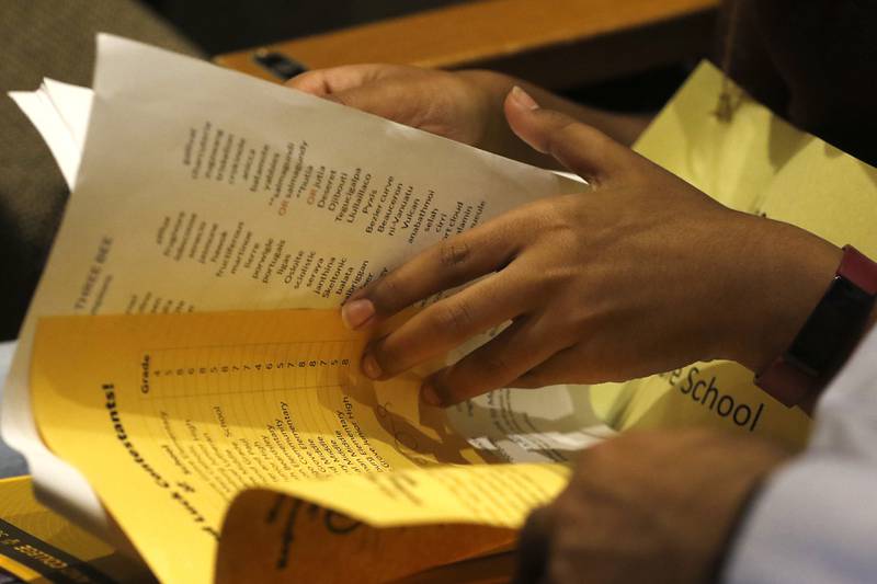 Neha Gopalakrishnan of Marlowe Middle School takes a moment before the start of the McHenry County Regional Office of Education 2023 Spelling Bee to look over some of the words on Wednesday, March 22, 2023, at McHenry County College's Luecht Auditorium in Crystal Lake.