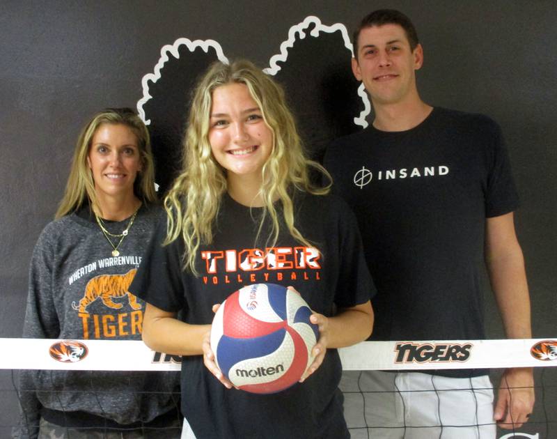 Wheaton Warrenville South sophomore Lauren Coyne (center) has continued her family's volleyball tradition. Mother Melissa (Rooney) Coyne (left) and uncle Sean Rooney are members of the WW South Athletic Hall of Fame.