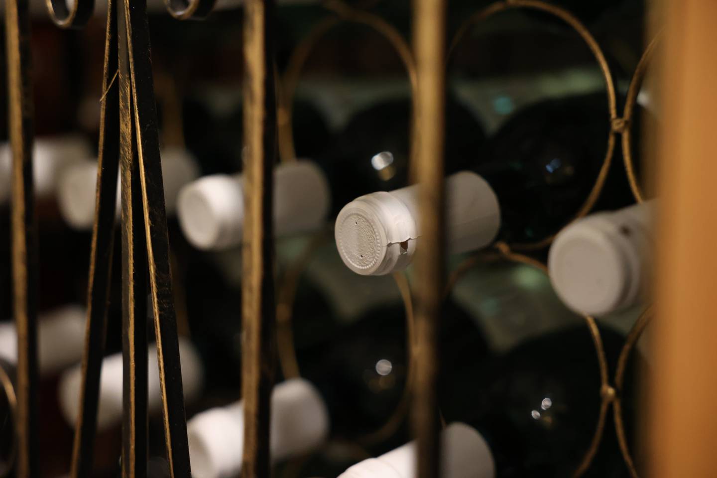 Wine sits in a case at Cut 158 Chophouse in Downtown Joliet.