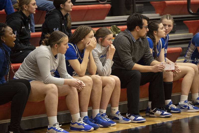 The Newman bench looks on late in the game against River Ridge Thursday, Feb. 20, 2025, during the Class 1A girls basketball regional at Forreston.