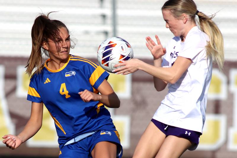 Johnsburg’s Ava Jablonski, left, battles North Shore Country Day’s Kate Connolly  in IHSA Class 1A Sectional Title Game action at Richmond-Burton High School in Richmond on Tuesday, May 27, 2025.