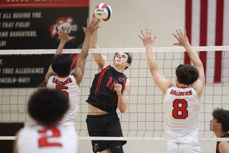 Lincoln-Way Central’s Logan Baechtold goes up for the kill against Bolingbrook on Tuesday May 7, 2024 in New Lenox.