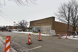 Roof of downtown Woodstock business collapses, road shut down amid concerns of further damage