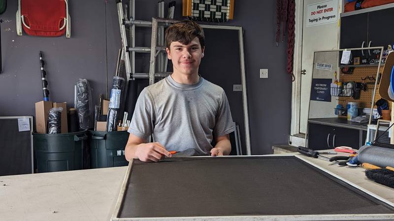 Dante Gentile, 15, of Romeoville, repairs screens in his garage on Friday, April 14, 2023. Dante Gentile started the screen repair business four years ago to help pay for Boy Scout activities. His sister Sophia Gentile, 11, sometimes helps to pay for her Girl Scout activities.