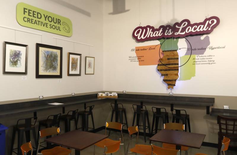 The dining area and local art display area at the Food Shed, McHenry County's first co-op grocery store, on Friday, May 10, 2024, The he store opens on May 15.