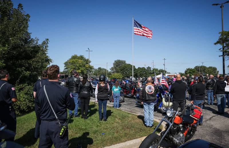 People gather during a Sept. 11 anniversary ride in Woodstock Sept. 6, 2025.