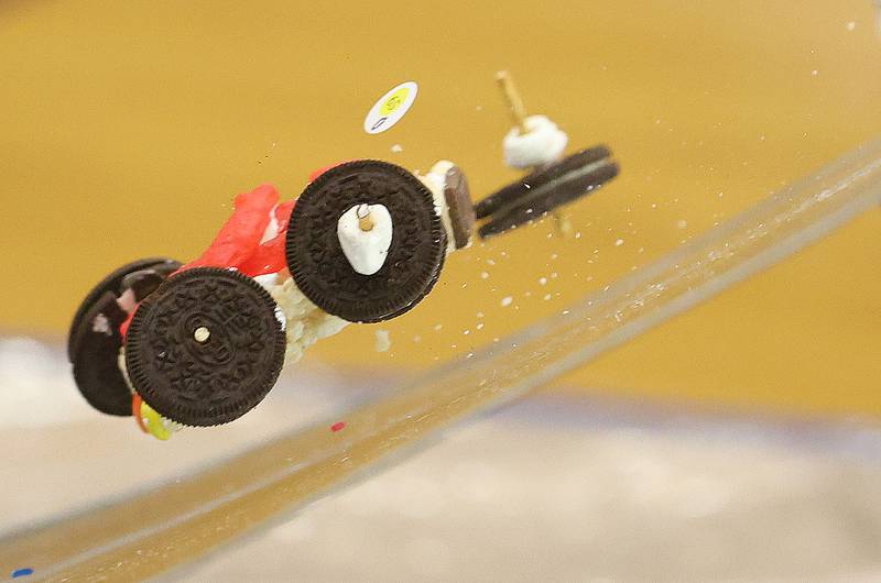 An Oreo car falls apart as it goes airborne off of the ramp during the Edible Car Contest on Wednesday, Feb. 25, 2026 at Illinois Valley Community College in Oglesby.