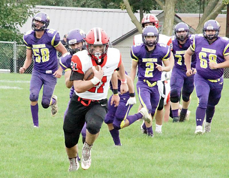 Amboy’s Quinn Leffleman runs for a TD Saturday, Sept. 24, 2022 against Orangeville.