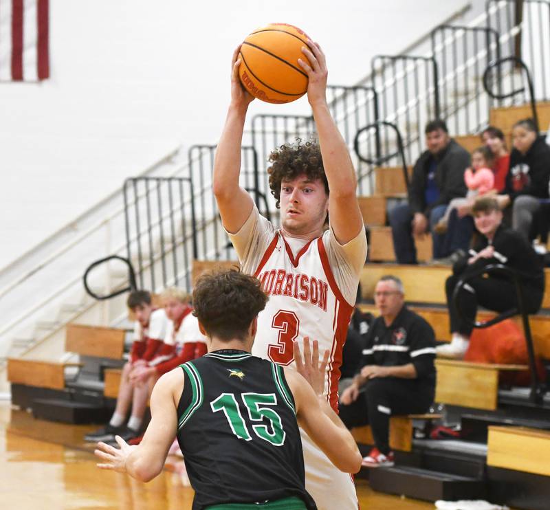 Morrison's Brayden Rubrright keeps the ball away from a North Boone defender at the Oregon Boys Basketball Thanksgiving Tournament on Wednesday, Nov. 26, 2025 at Oregon High School.