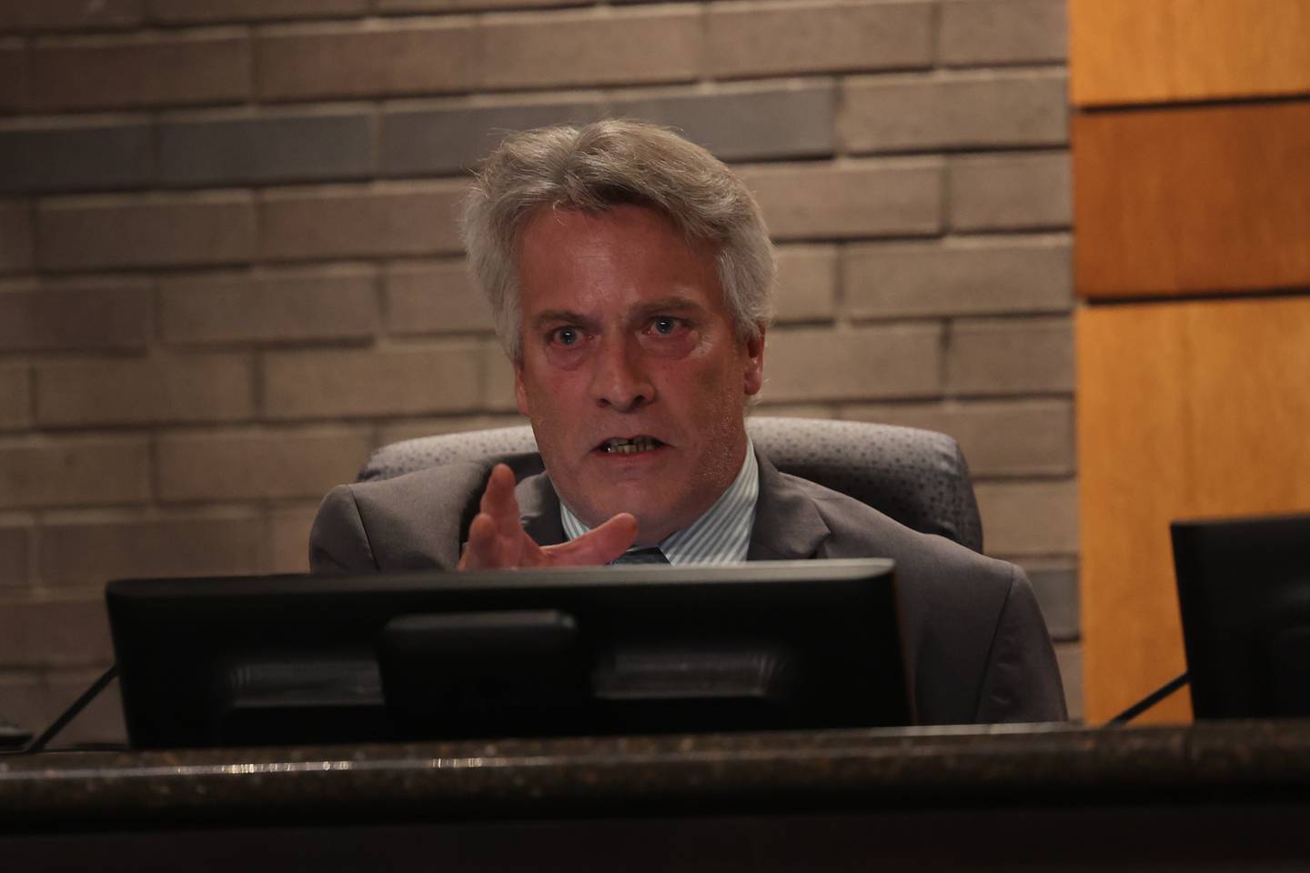 Larry Hug shares his concerns regarding the apartment house at 1000 Cora St., which is being used to house convicted sex offenders during the Joliet City Council meeting on Tuesday. Tuesday, July 19, 2022 in Joliet.