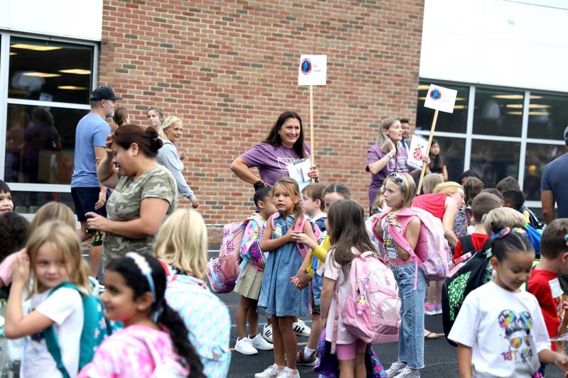 Students at Wild Rose Elementary School in St. Charles line up for the first day of school on Monday, Aug. 14, 2023.