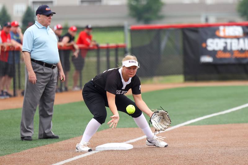 Prairie Ridge's Bella Moore waits for a throw to third during the Wolves' 5-0 loss to Glenwood in the IHSA Class 3A state semifinal on June 13, 2025.