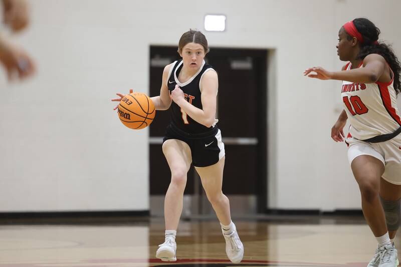 Lincoln-Way West’s Kaitlyn Weaver works the ball upcourt against Lincoln-Way Central on Tuesday, Jan 28, 2025 in New Lenox.