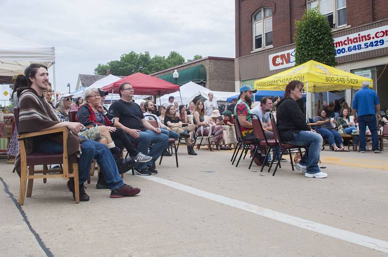 Fans listen to music at Rosbrook Studio’s street fair Saturday, June 11, 2022 in downtown Dixon. The music lineup was diverse, running from 3 pm to 10 pm with more than 50 musicians taking part in the music and art venue fundraiser.