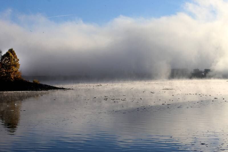 Fog begins to lift from the Illinois River near Plum Island on Thursday, Oct. 24, 2024 in Starved Rock State Park.