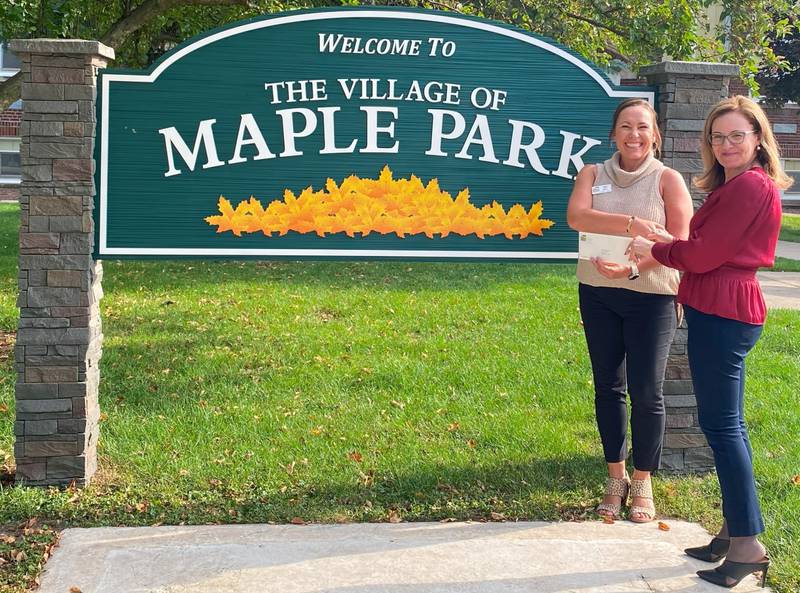 Village of Maple Park president Suzanne Fahnestock receiving a $20,000 DeKalb County Community Foundation implementation grant