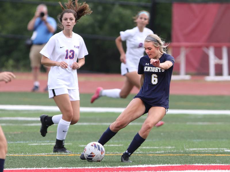 IC Catholic Prep's Matea O'Donnell kicks the ball away from Pleasant Plains' Sophia Taft during the IHSA Class 1A state girls soccer third place game Saturday, May 27, 2023, at North Central College in Naperville.