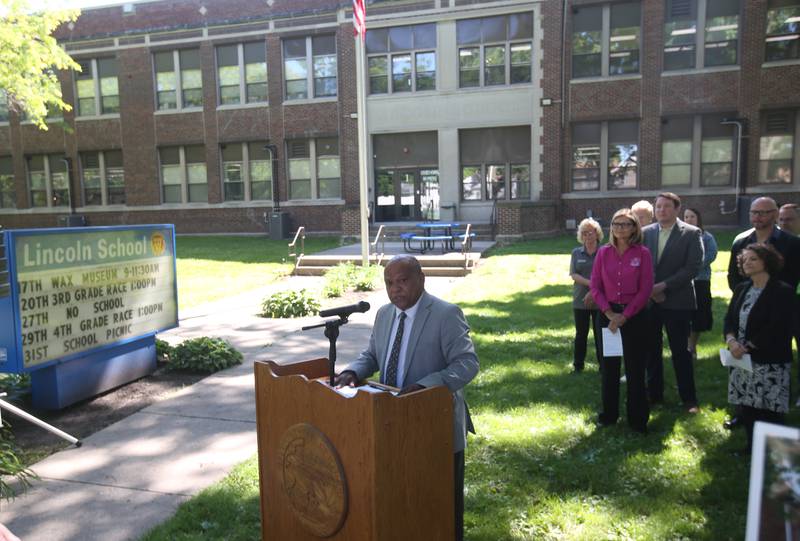 Illinois Transportation Secretary Omer Osman delivers a speech outside of Lincoln Elementary on Thursday, May 30, 2024 in Mendota. Illinois Transportation awarded Mendota for new sidewalks that help students more opportunities to walk, bike and roll as part of the Safe Routes to School Program.
