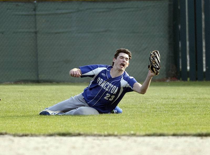 Princeton’s Noah LaPorte dives for a catch against Newman Thursday, April 10, 2025.