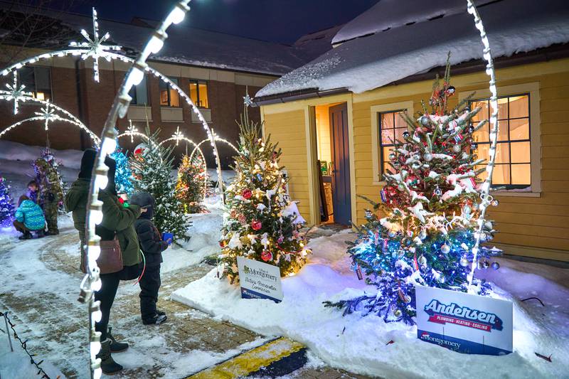 Residents – along with Santa – attended the village of Montgomery's ceremonial tree lighting and opening of this year’s Festival of Trees display in front of Village Hall on Sunday, Dec. 7.