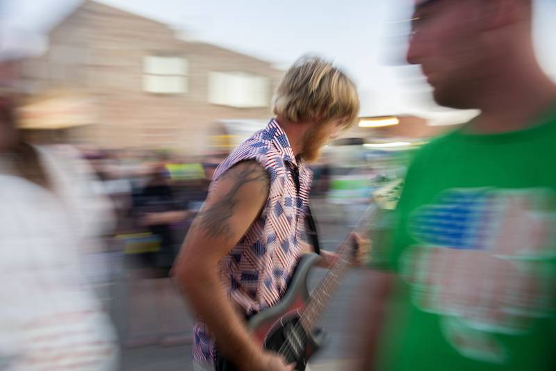 The guitarist for local band “Class Field Trip,” joins the crowd Saturday, July 2, 2022 at Dixon’s Petunia Fest.