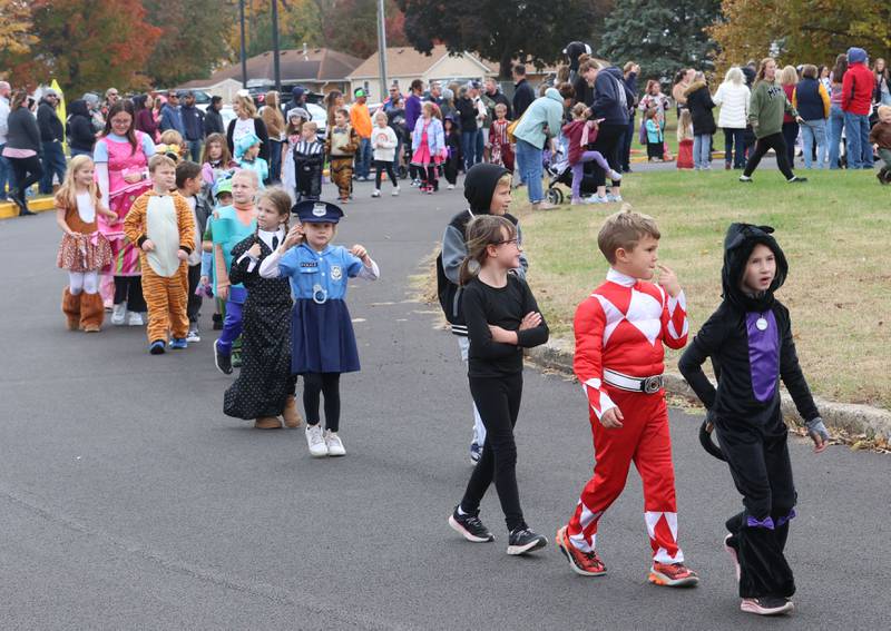 Students from Jefferson Elementary walk around the school during a Halloween parade on Friday, Oct. 31, 2025 in Princeton.