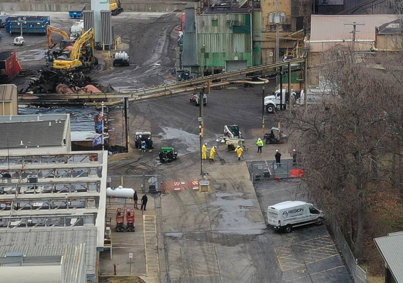 A hazmat team cleans up chemicals at Carus Chemical on Tuesday, Jan. 17, 2023 in La Salle.