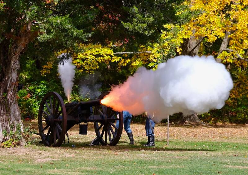 Soldiers fire a fake canon during the Shadows of the Blue and Gray event on Sunday, Oct. 13, 2024 at City County Park in Princeton.
