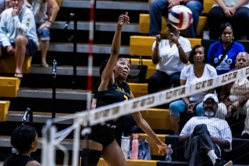 Joliet West's Na’Riah Autman spikes during a varsity volleyball home game against Lincoln-Way West on Sept. 15, 2025.